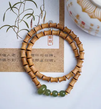Laoshan bambuko apyrankės atitikimas: 6*7 Hetian Jade reikšmė Aukštas festivalis, minkšta ir šilta kolekcija Išplėstinis paprastas išskirtinis