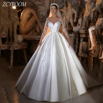 Prabangios baltos V formos kaklo blizgučių aplikacijos ilgomis rankovėmis vestuvinė suknelė be nugaros 2024 m. 