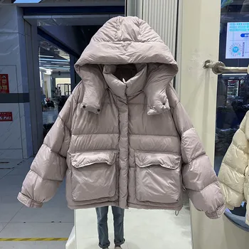 2023 Nauja trumpa pūkinė striukė Moterys Madinga su gobtuvu Laisvas žiemos laisvalaikio korėjietiškas paltas Moteriškas Solid Chic Warm Parkas