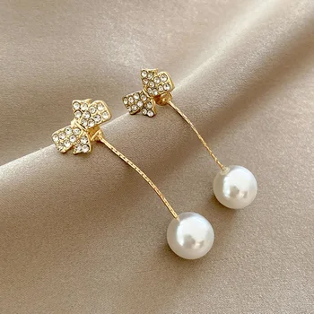 2023 Ponios elegantiški šviesiai balti perlų pakabukų auskarai Korėjos mados papuošalai Prabangūs aksesuarai Ilgi auskarai Auksas